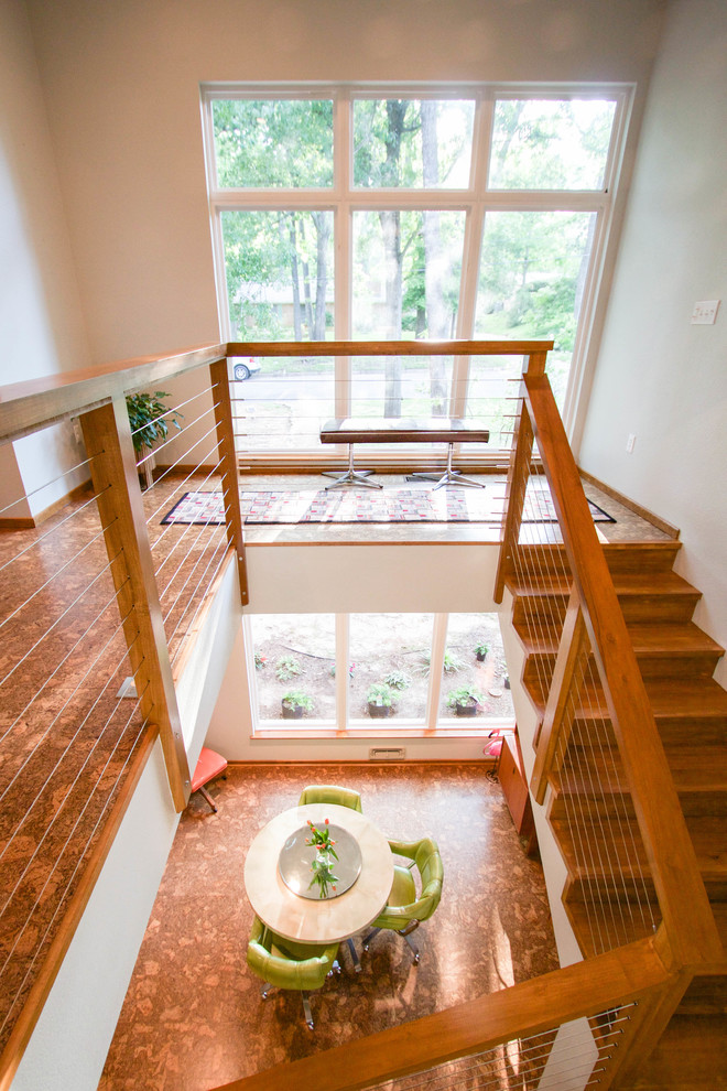 Mid-sized mid-century modern wooden l-shaped staircase photo in Dallas with wooden risers