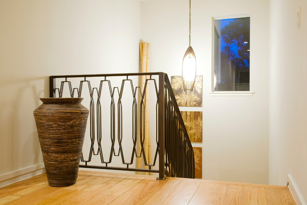 Foto de escalera en L retro con escalones de madera y contrahuellas de madera
