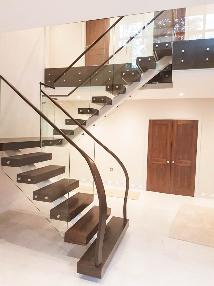 Example of a trendy staircase design in Surrey