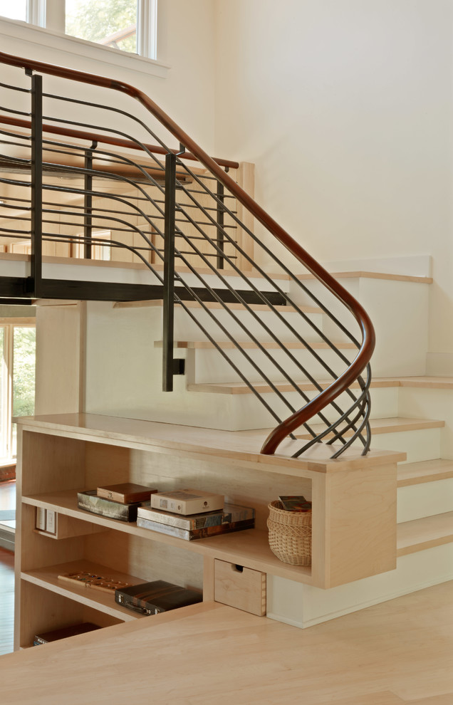 Inspiration for a large rustic wooden u-shaped staircase remodel in Burlington with painted risers