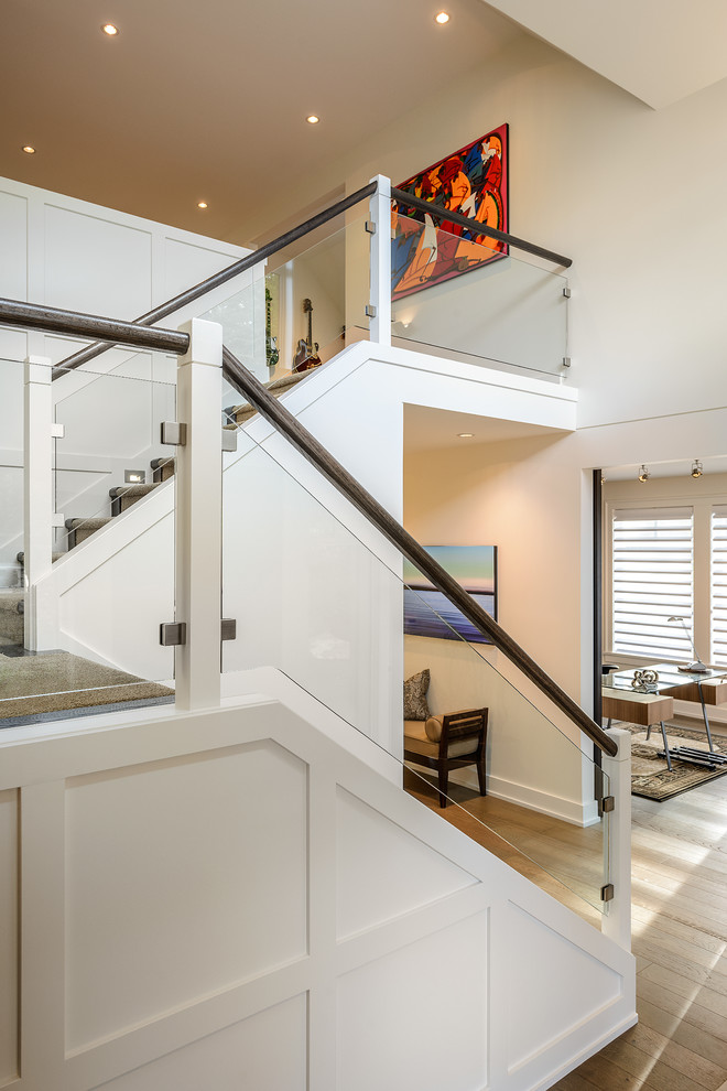 Design ideas for a contemporary u-shaped staircase in Vancouver.