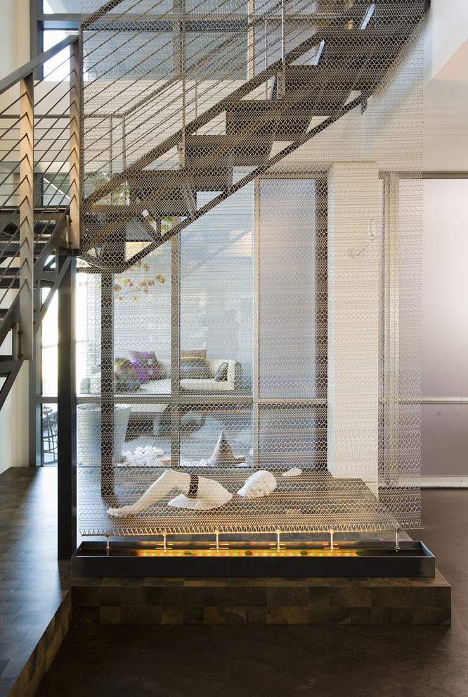Trendy l-shaped open staircase photo in Seattle
