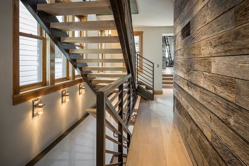 Design ideas for a medium sized rustic wood straight metal railing staircase in Phoenix with open risers.