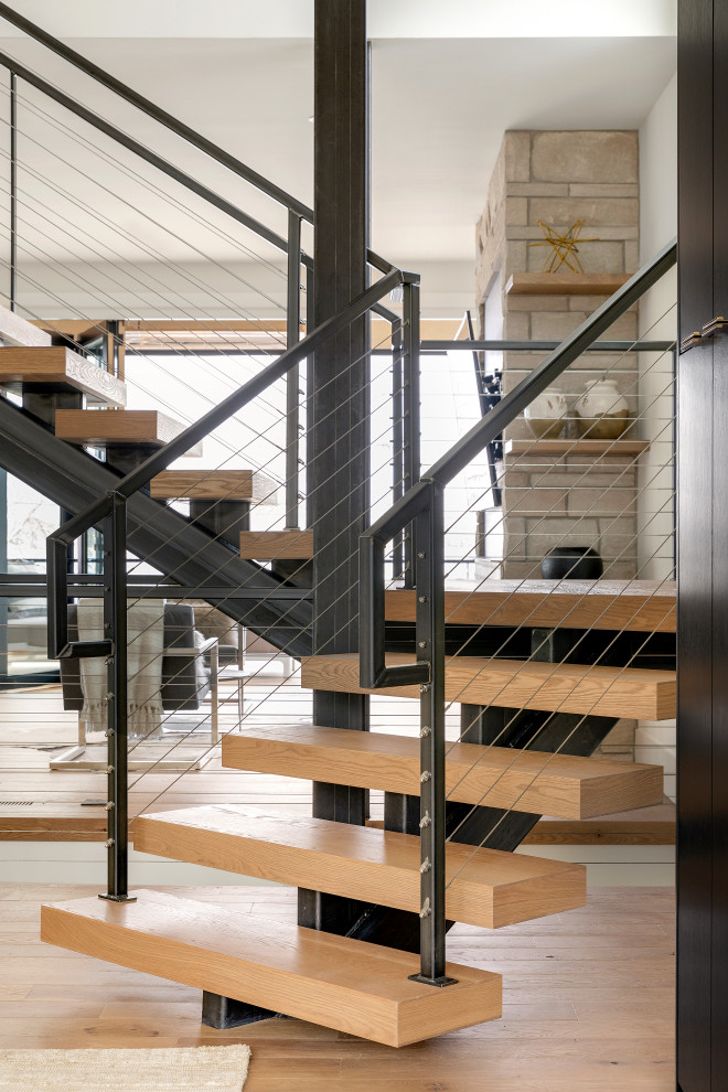 Design ideas for a large contemporary staircase in Minneapolis.