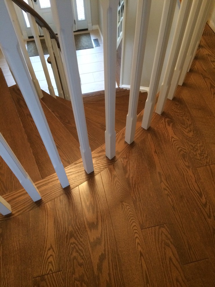 Mississauga hardwood stairs reno with square white spindles showing