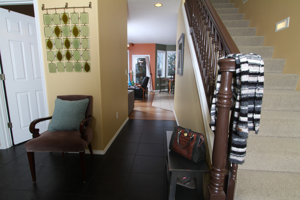 Small eclectic carpeted straight staircase photo in Portland with carpeted risers