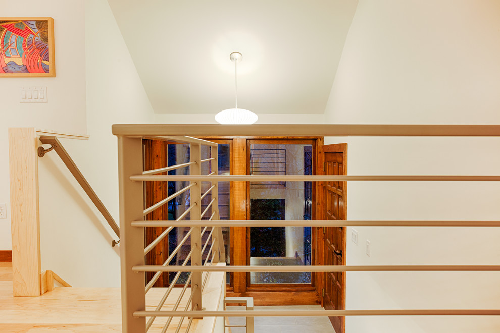 Medium sized rural wood straight staircase in Philadelphia with wood risers.