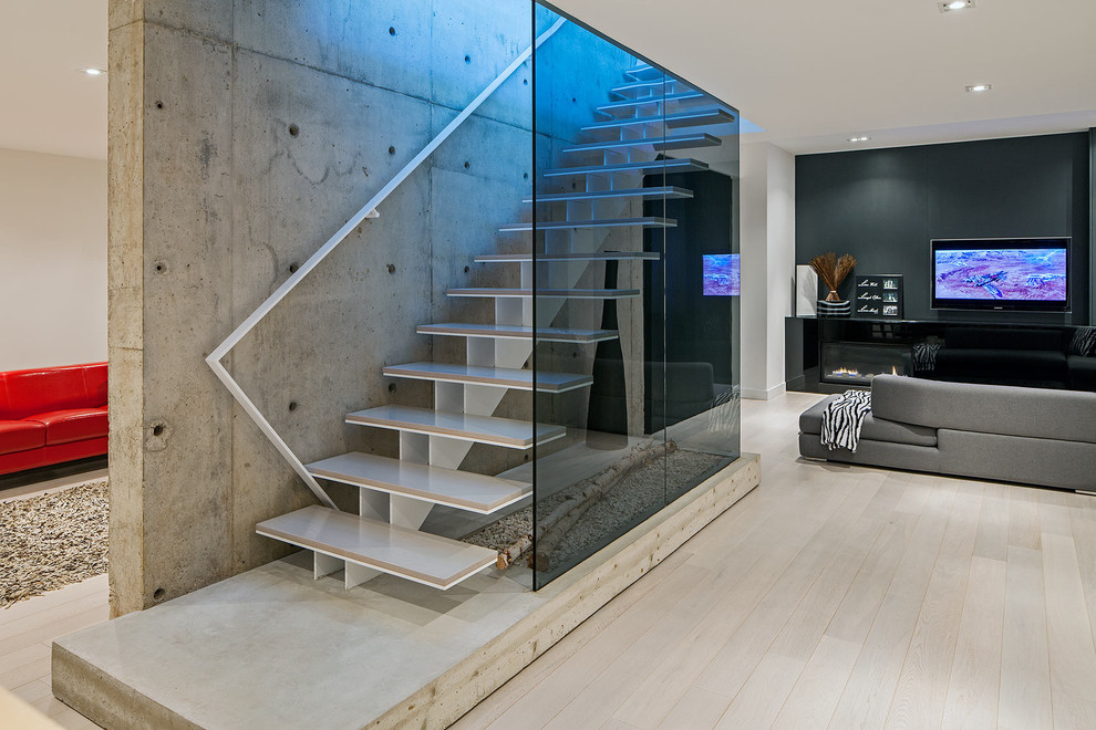 Inspiration for a scandinavian open staircase remodel in Toronto