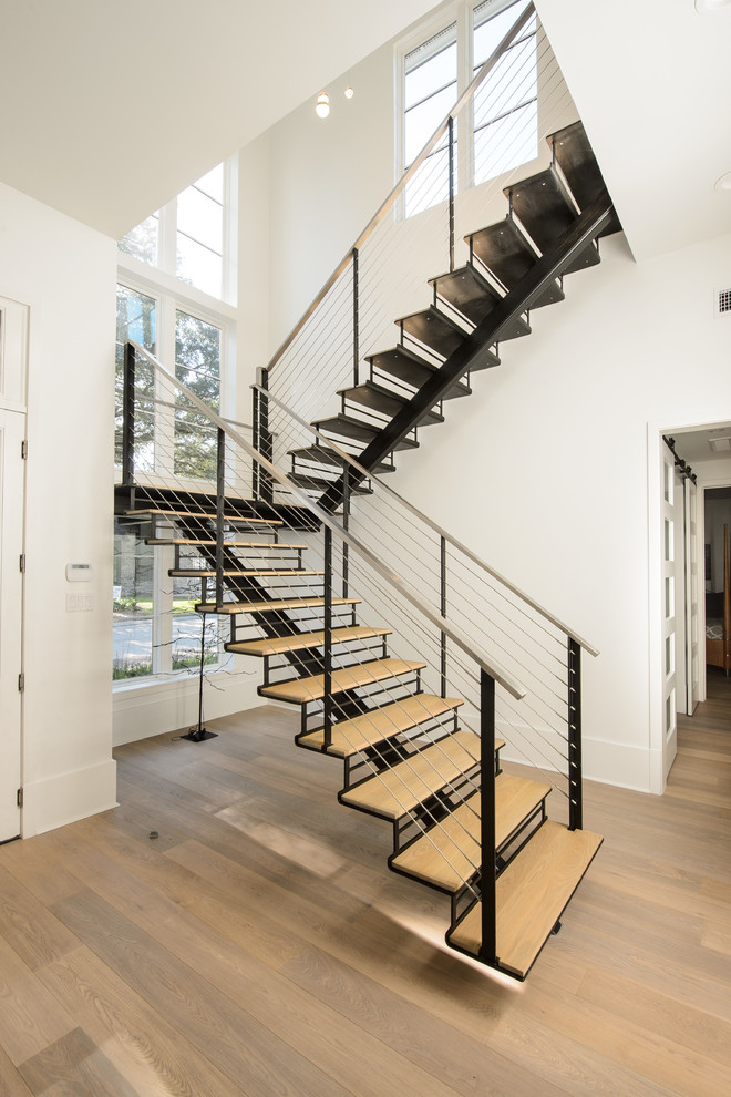 Источник вдохновения для домашнего уюта: лестница на больцах, среднего размера в стиле модернизм с деревянными ступенями без подступенок
