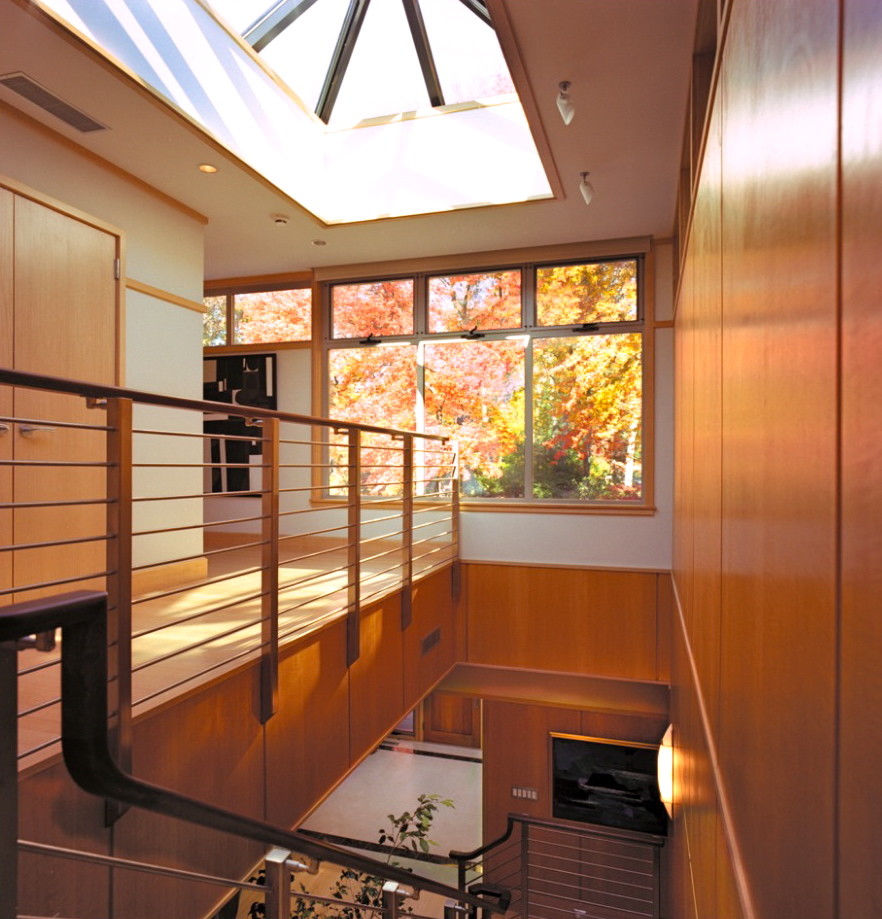 Свежая идея для дизайна: угловая деревянная лестница среднего размера в стиле ретро с деревянными ступенями - отличное фото интерьера