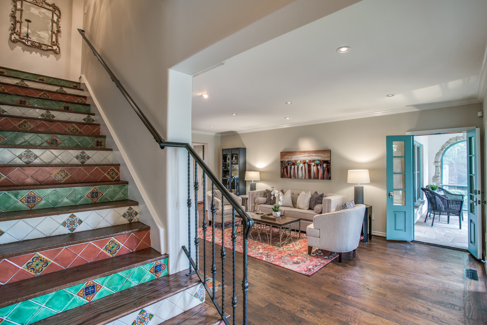 Example of a mid-sized tuscan wooden straight metal railing staircase design in Dallas with tile risers