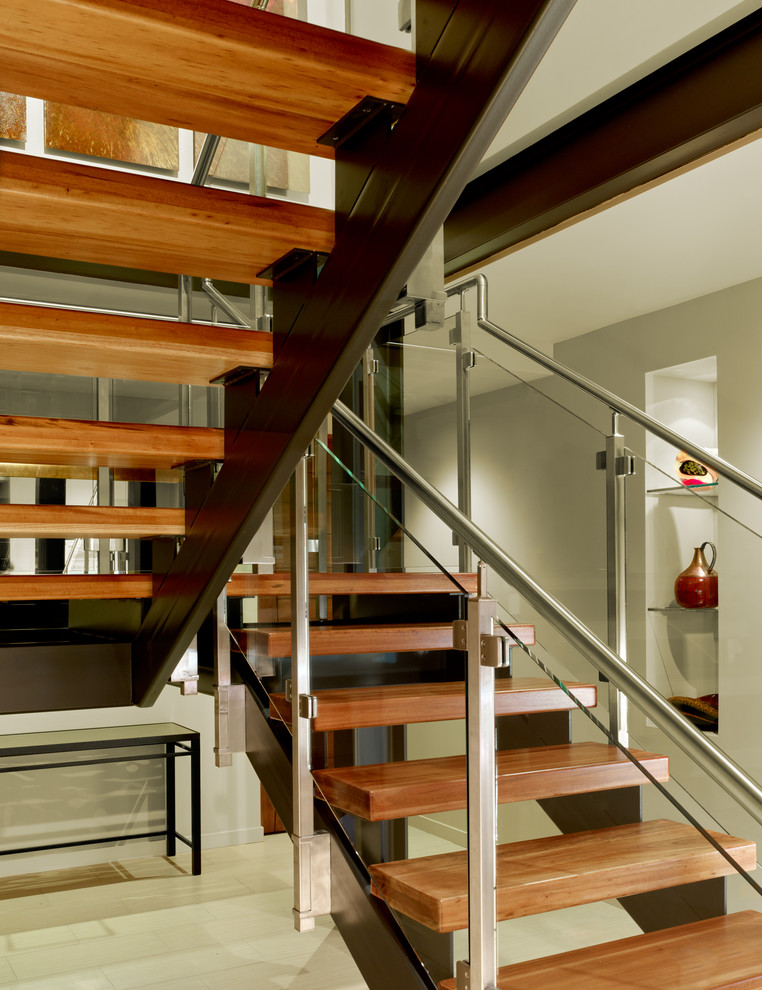 Inspiration for a medium sized modern wood floating staircase in San Francisco with wood risers.