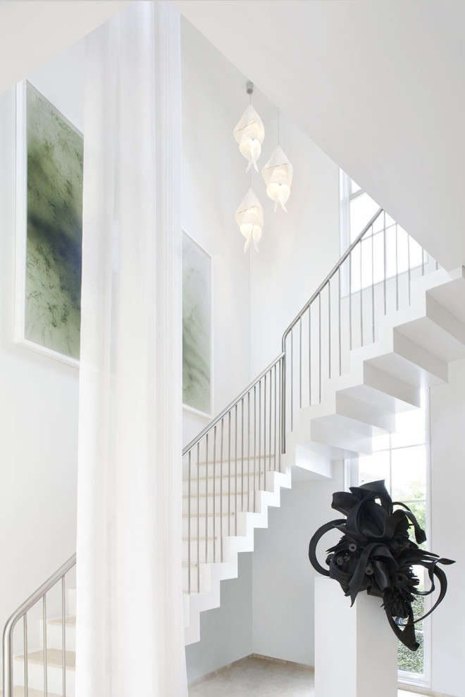 Design ideas for a contemporary l-shaped staircase in Miami.