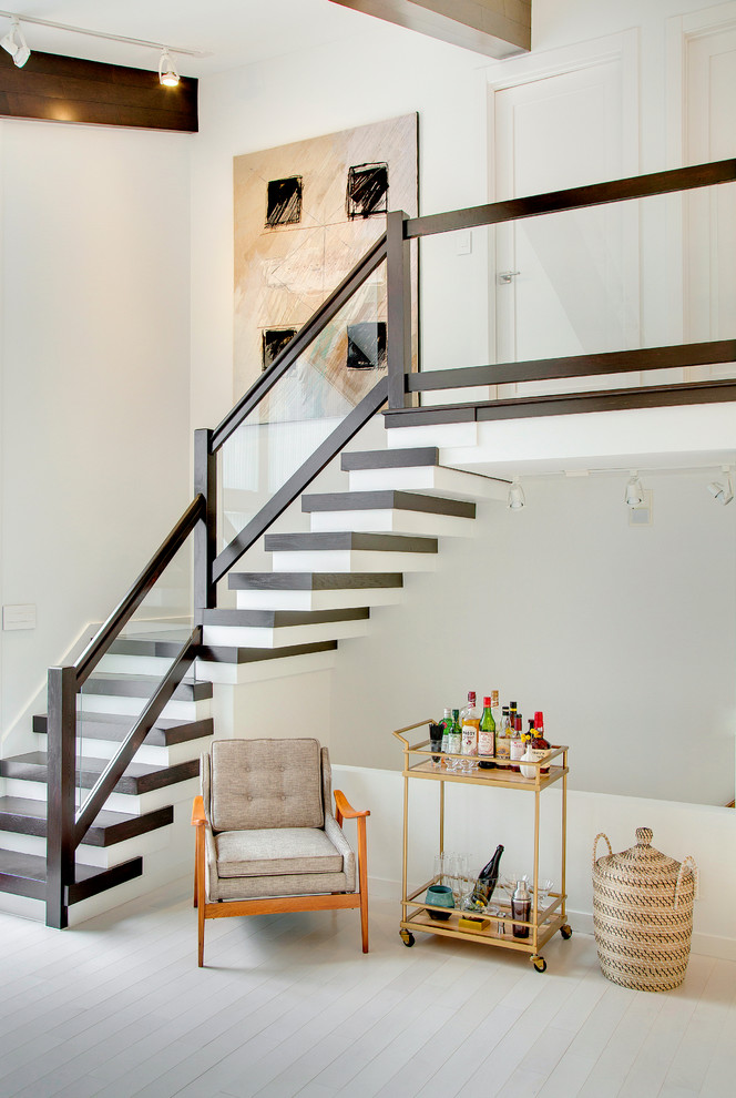 Example of a small danish wooden l-shaped staircase design in Minneapolis with painted risers