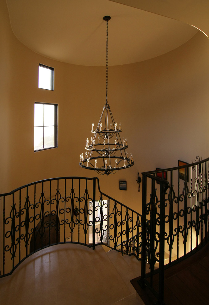 Medium sized mediterranean curved staircase in Los Angeles.