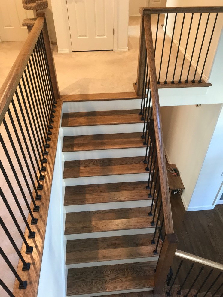 Staircase - large mid-century modern wooden l-shaped wood railing staircase idea in Portland with painted risers