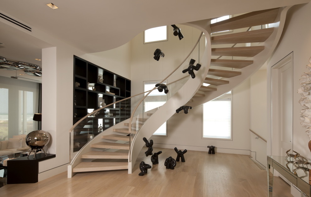 Design ideas for a modern staircase in Other with open risers.