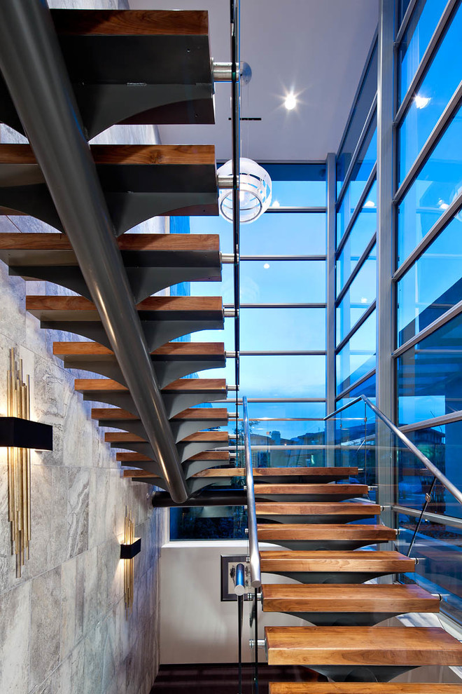 Inspiration for a contemporary wooden open staircase remodel in Orange County