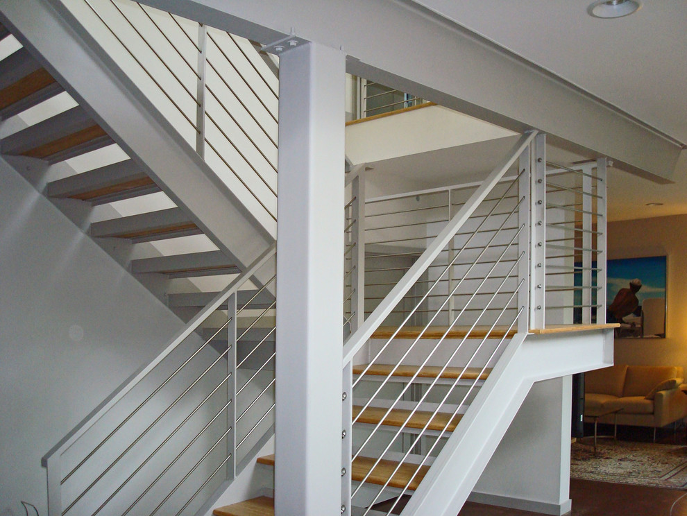 Источник вдохновения для домашнего уюта: п-образная лестница в стиле ретро с деревянными ступенями без подступенок