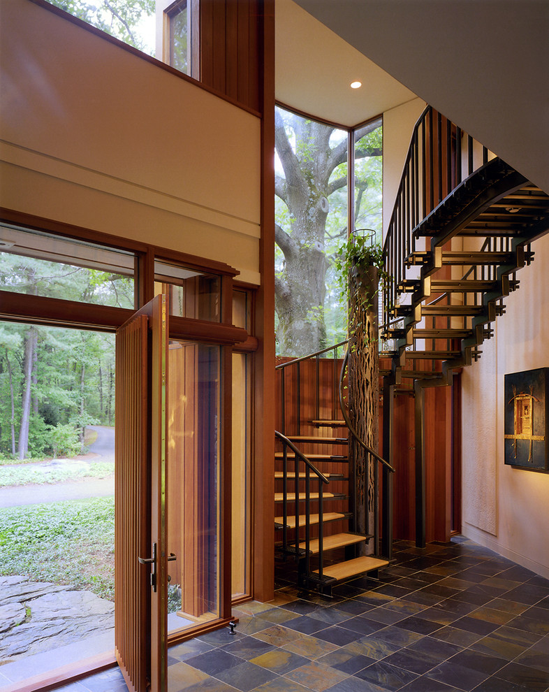 Inspiration for a contemporary staircase in Boston with open risers and feature lighting.