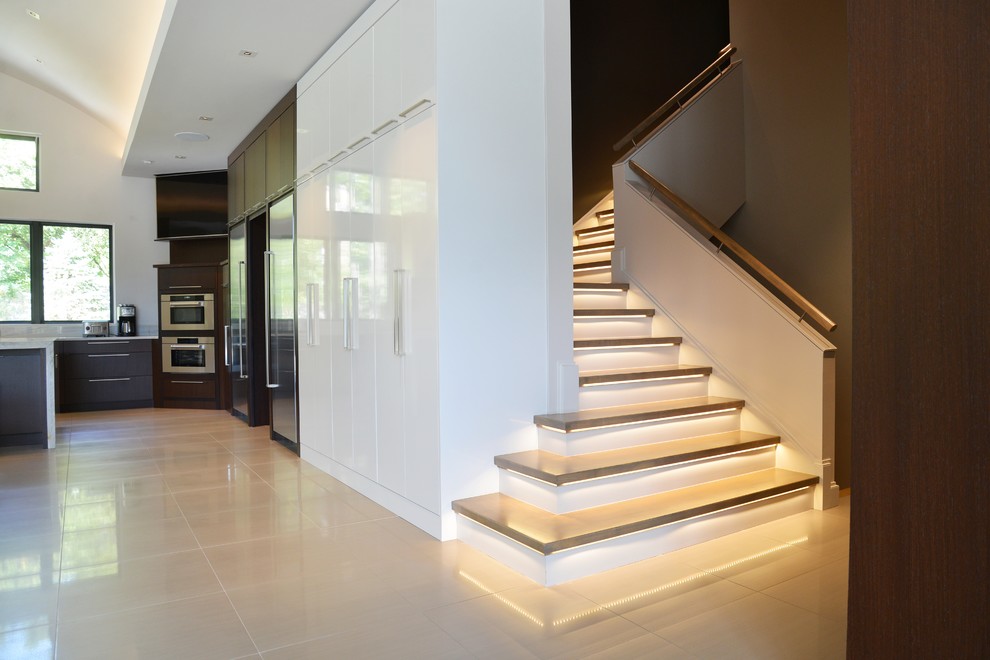 Example of a large trendy l-shaped wood railing staircase design in St Louis