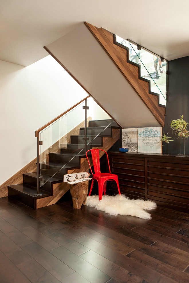 Design ideas for a contemporary wood u-shaped staircase in San Francisco with wood risers.