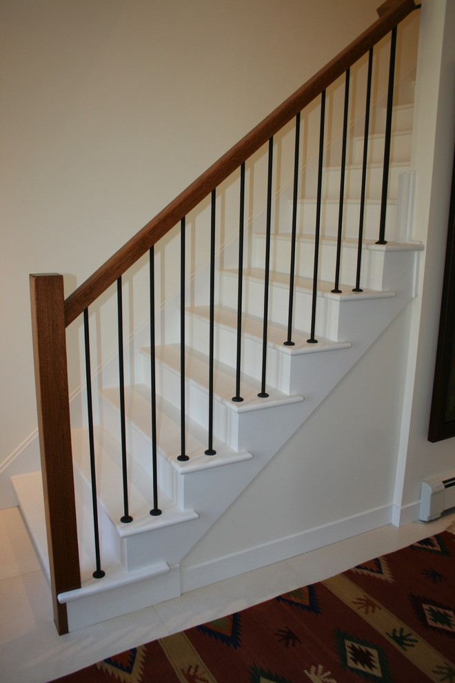 Photo of a medium sized contemporary painted wood wood railing staircase in Toronto with painted wood risers.