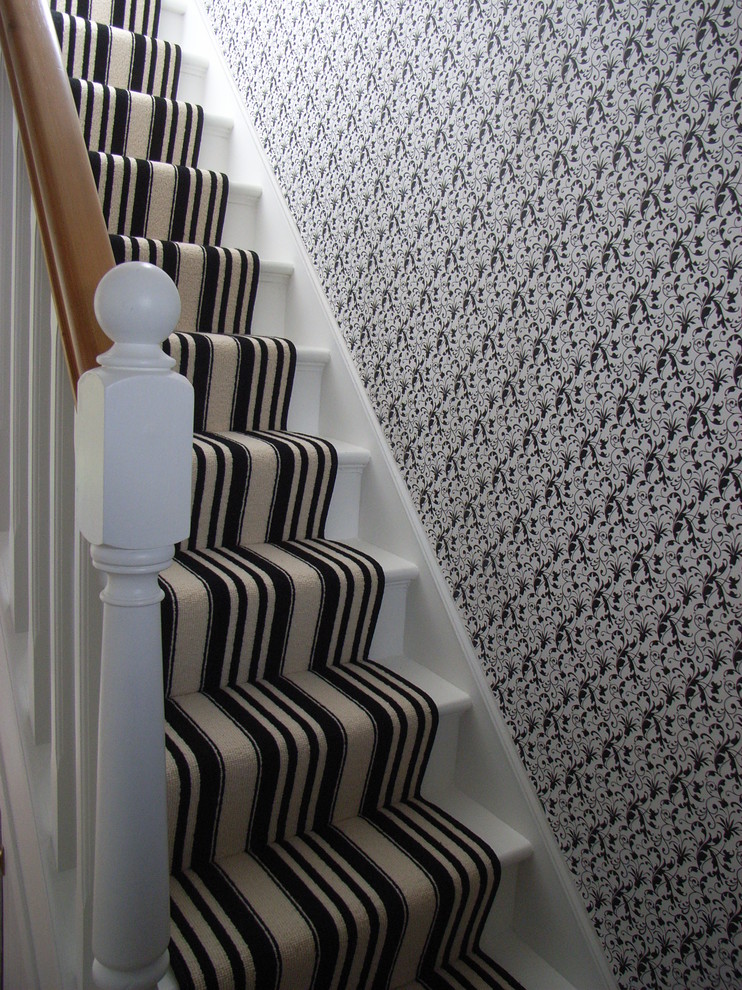 Inspiration for a medium sized contemporary carpeted straight staircase in Other with carpeted risers.