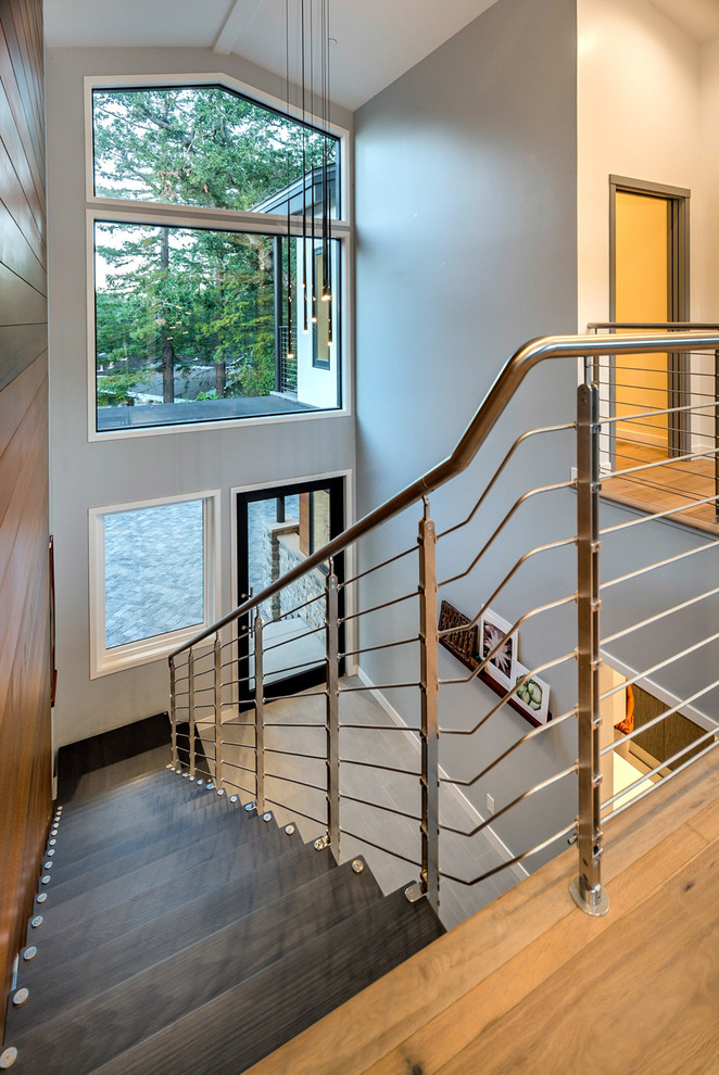 Example of a large trendy wooden straight staircase design in San Francisco