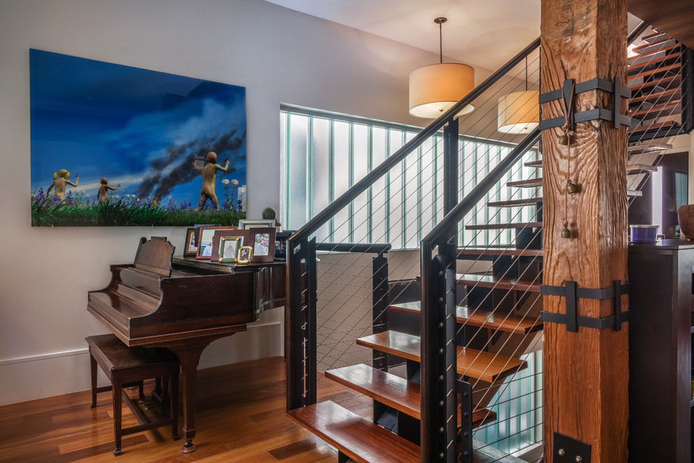 Mid-sized minimalist wooden straight open and mixed material railing staircase photo in Houston