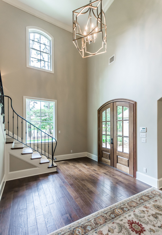 Inspiration for a large timeless wooden l-shaped staircase remodel in New Orleans with painted risers