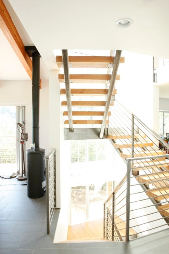 Staircase - mid-sized modern wooden u-shaped open staircase idea in San Francisco