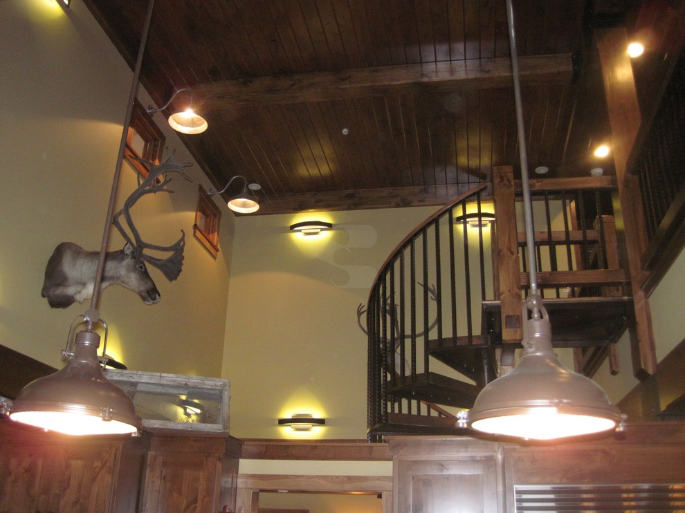 This is an example of a medium sized rustic staircase in Minneapolis.