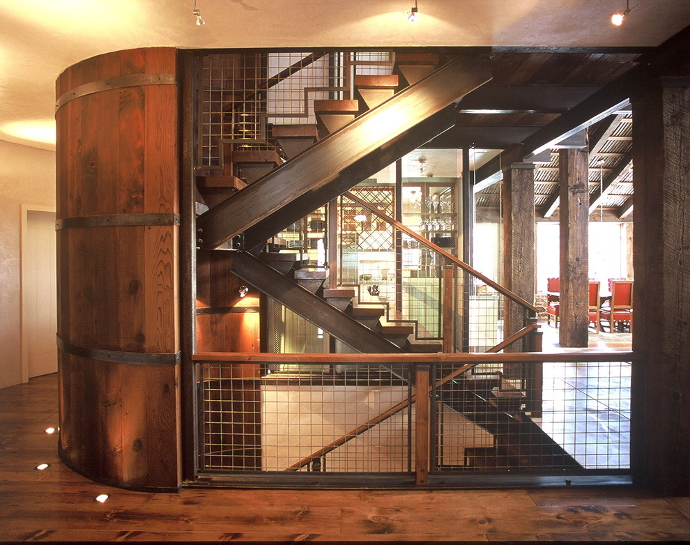 Example of a mid-sized trendy wooden u-shaped open and mixed material railing staircase design in Denver