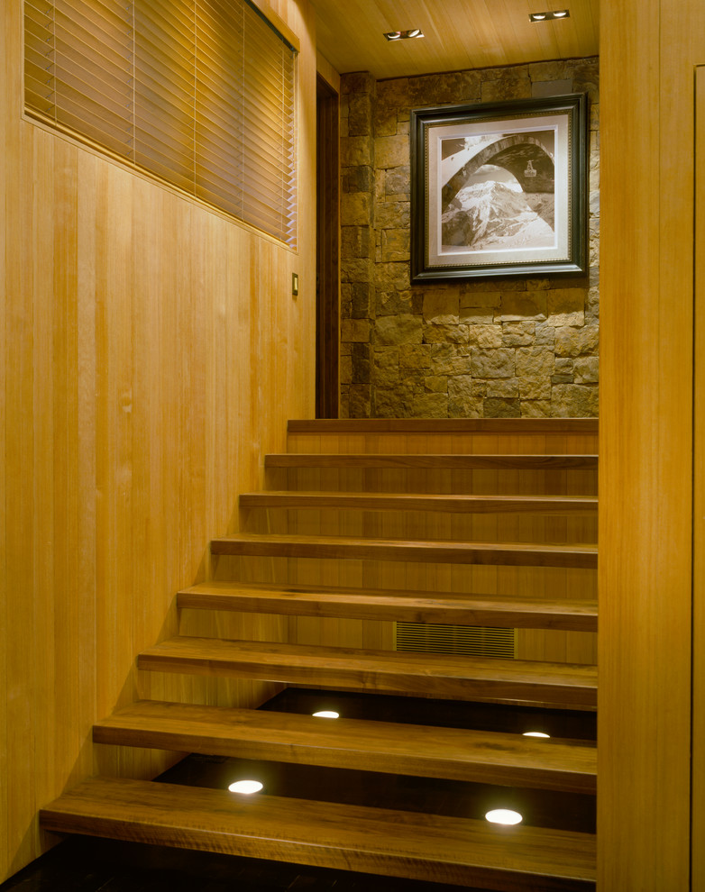 Modelo de escalera recta rústica sin contrahuella con escalones de madera