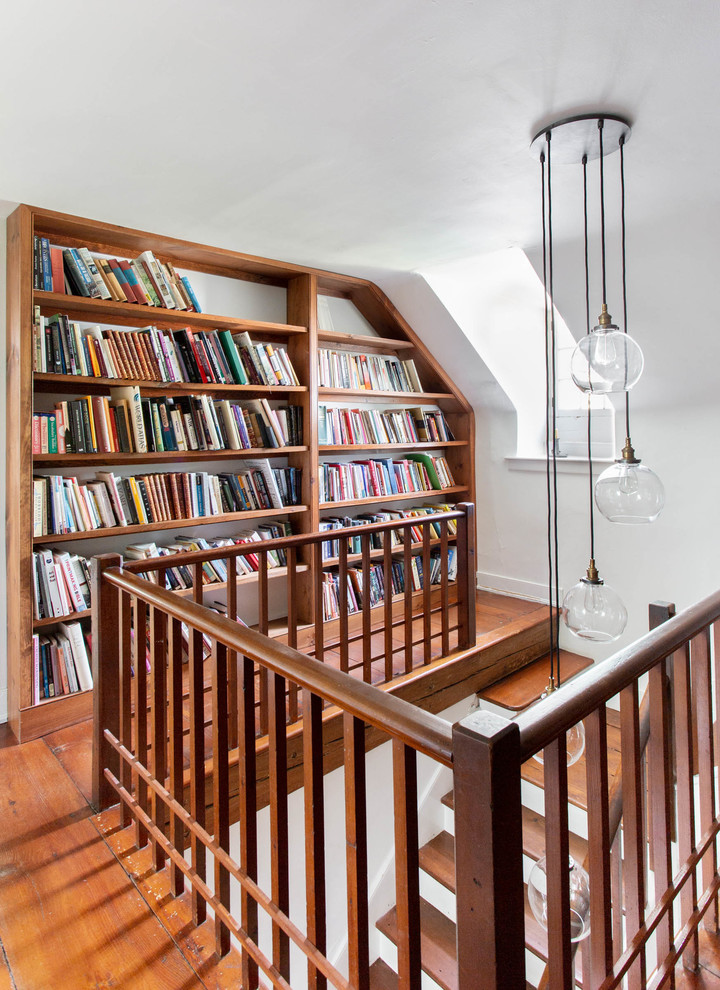 Example of a farmhouse staircase design in Other