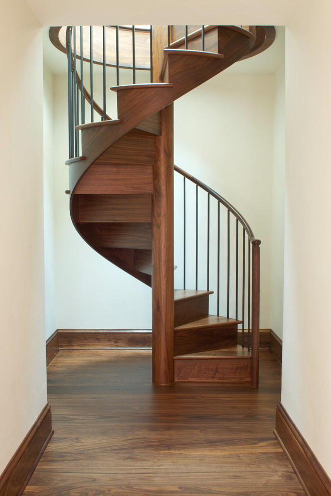 Inspiration for a rustic spiral staircase remodel in Other