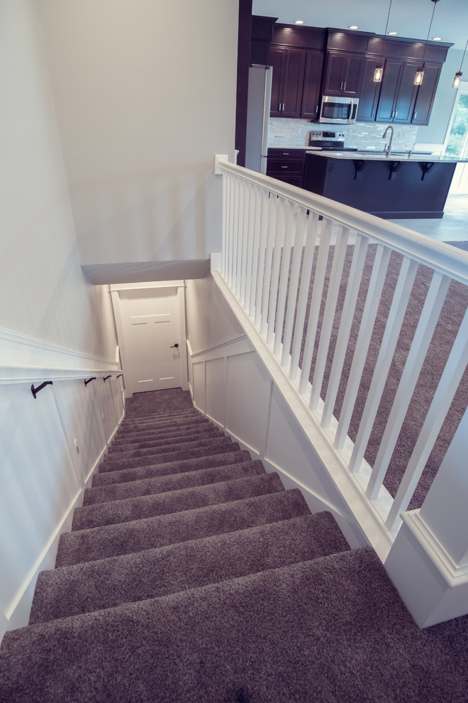 Medium sized traditional straight staircase in Boise.