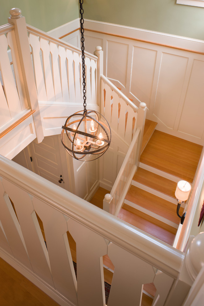 Design ideas for a beach style wood railing staircase in Providence.