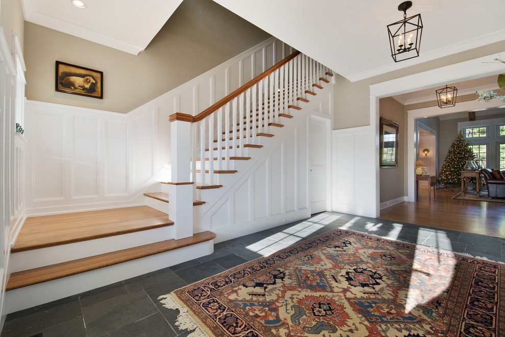 Staircase - large transitional wooden l-shaped wood railing staircase idea in Philadelphia with painted risers