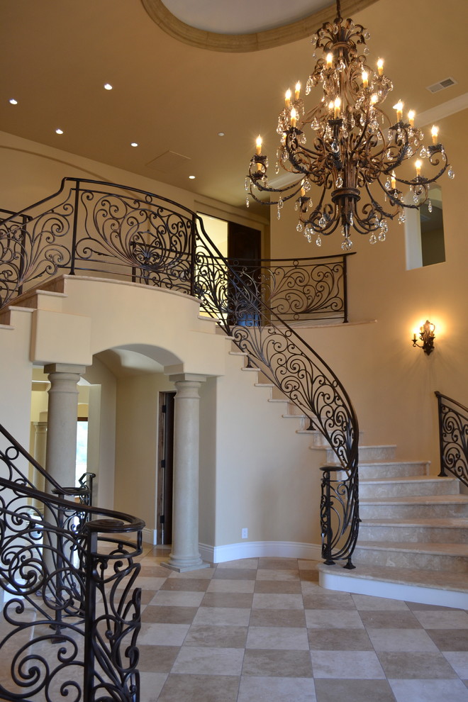 Design ideas for an expansive traditional u-shaped staircase in San Francisco.
