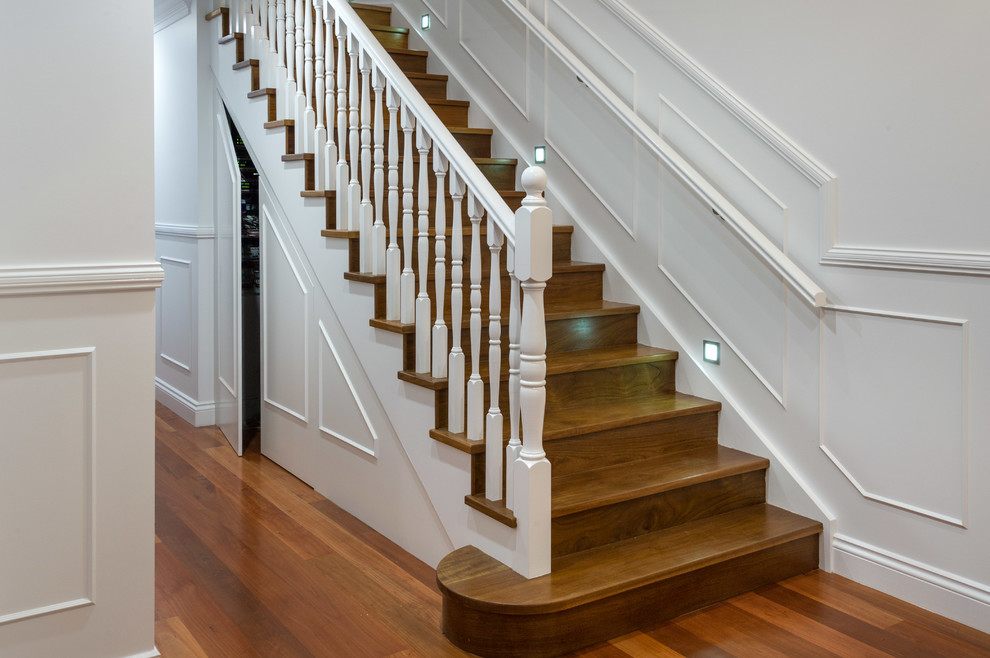Inspiration for a contemporary wooden straight staircase remodel in Brisbane with wooden risers
