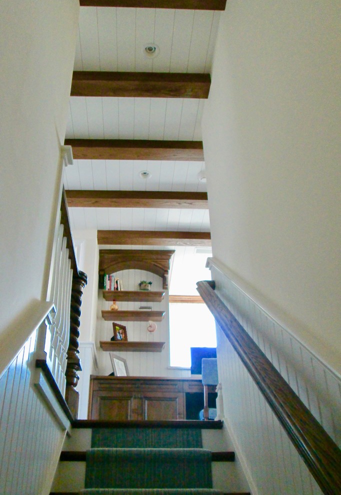 Design ideas for a classic straight wood railing staircase in Philadelphia with carpeted risers.