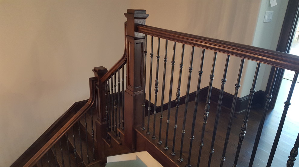 Design ideas for a large mediterranean wood l-shaped wood railing staircase in New York with wood risers.
