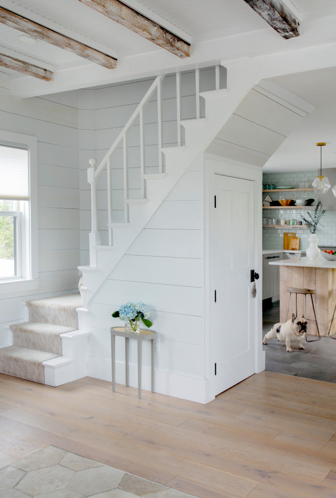Example of a beach style staircase design in Boston