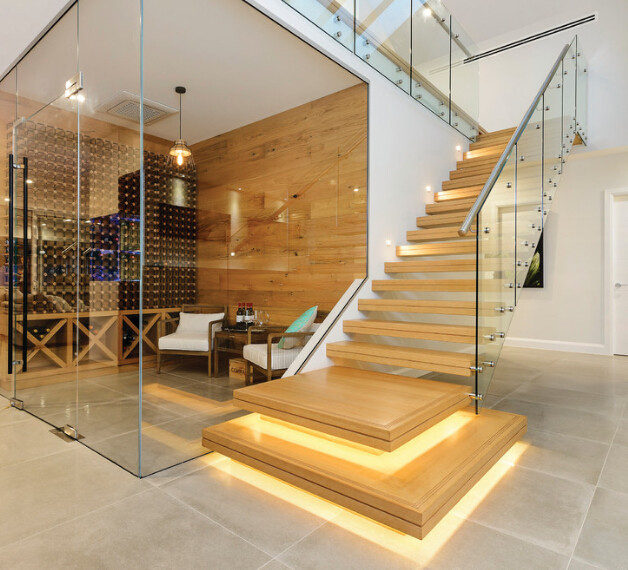 Example of a mid-sized minimalist wooden straight open and glass railing staircase design in Other