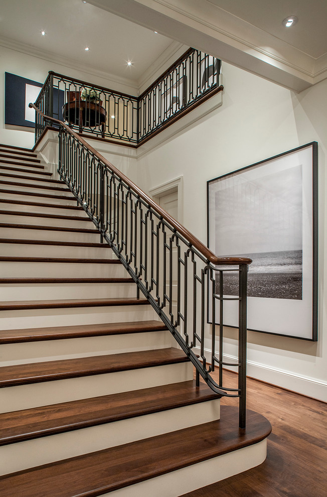 Elegant wooden straight mixed material railing staircase photo in Portland with painted risers