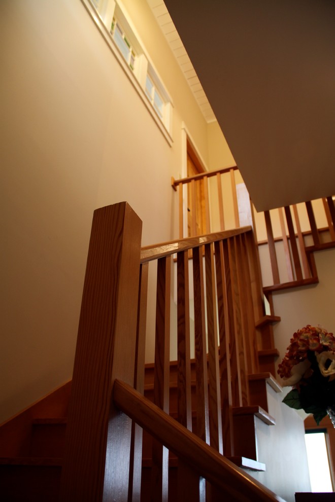 Example of a farmhouse staircase design in Portland Maine