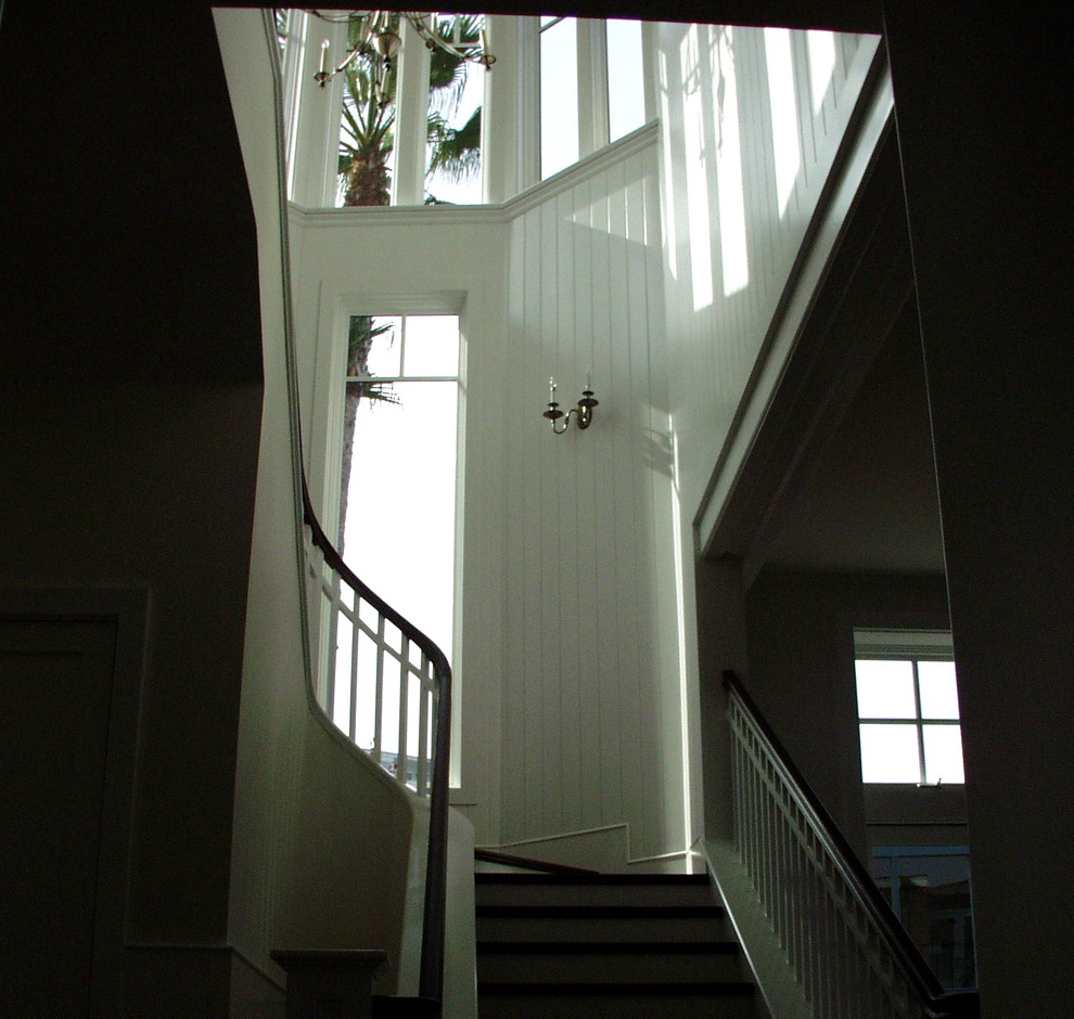 Example of a beach style staircase design in Orange County