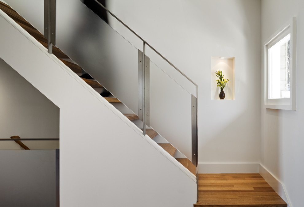 Inspiration for a modern staircase in San Francisco with open risers.